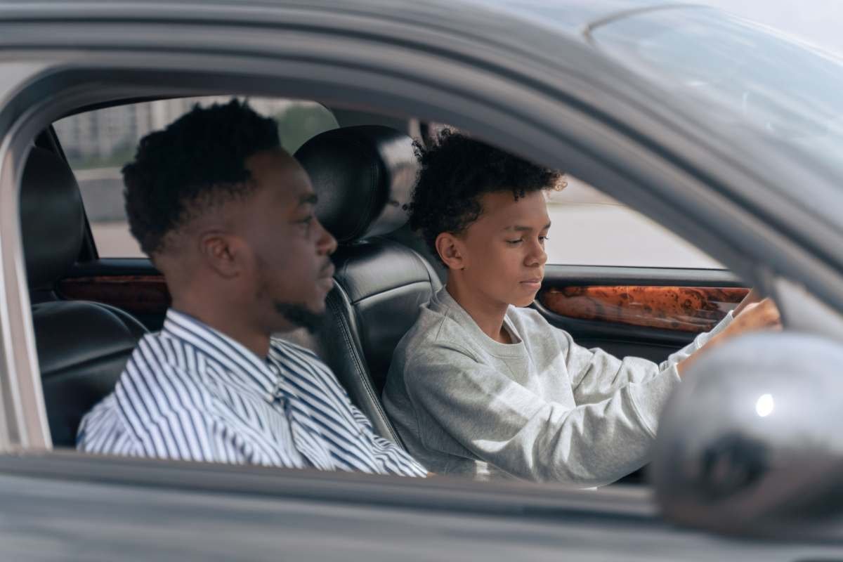 Student learning to drive with instructor